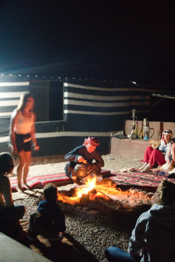 see wadi rum camp at night with tea